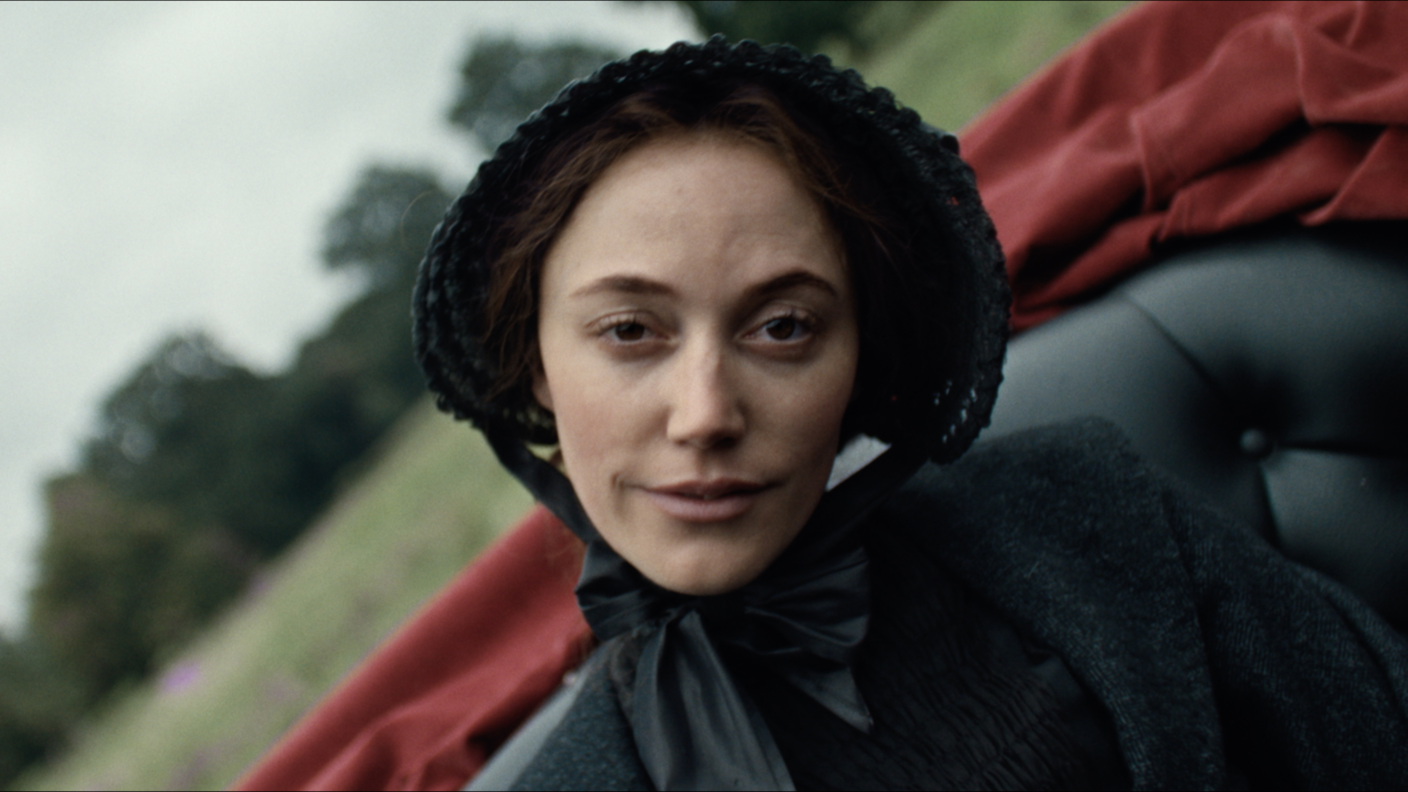 Victorian Psycho — a woman in a black bonnet beside a carriage